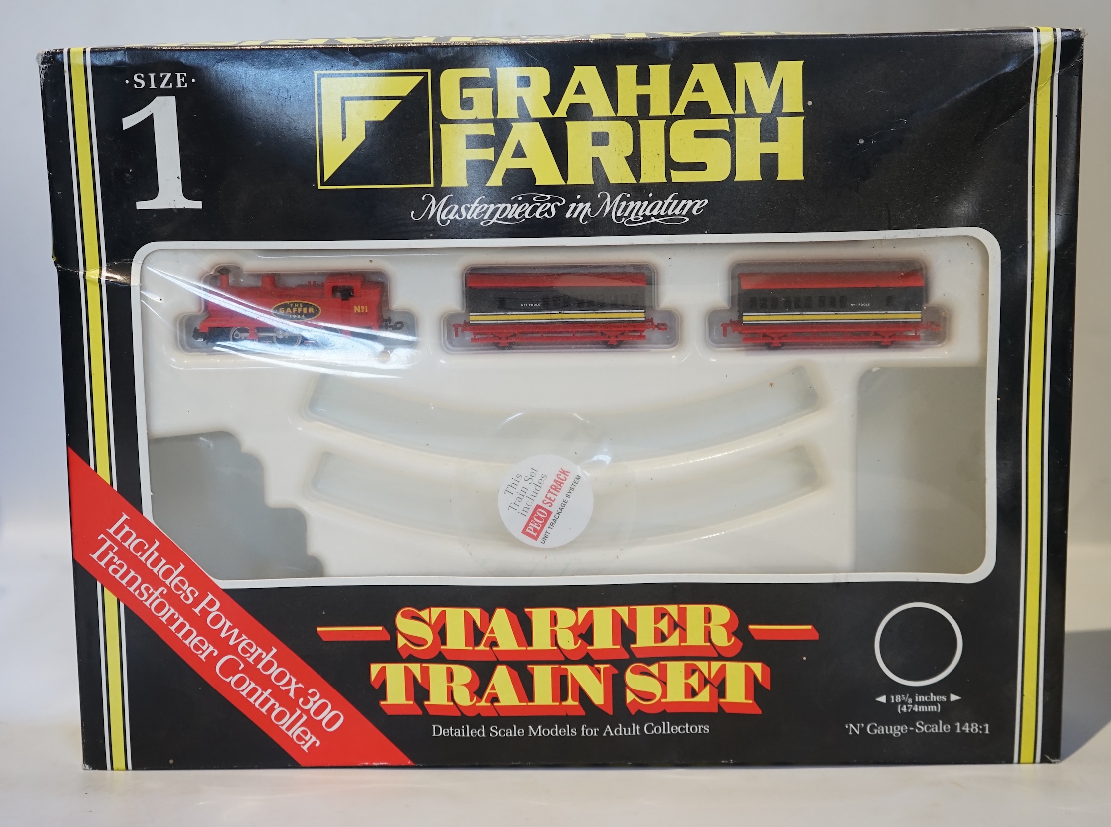 Four boxed Graham Farish N gauge railway train sets; a Diesel Freight set, comprising a Class 25 diesel locomotive and five freight wagons, together with a J94 Freight set with three wagons (370-050), a Queen Elizabeth G